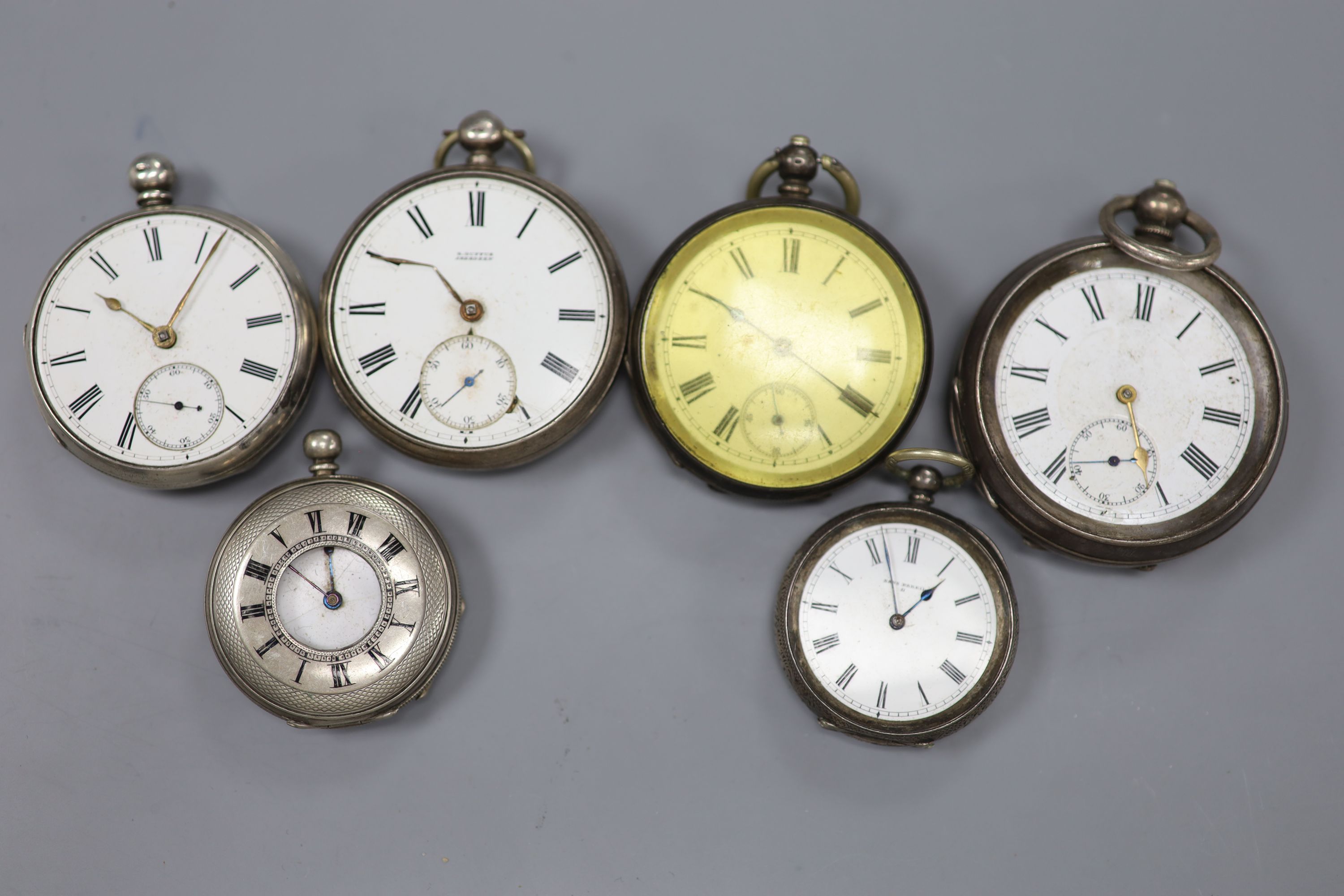Three assorted silver pocket watches, a white metal pocket watch and two similar fob watches (a.f.).